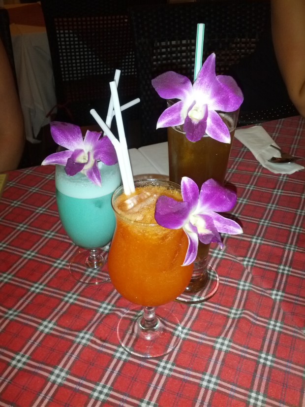Orchids with cocktails in Phuket, Thailand